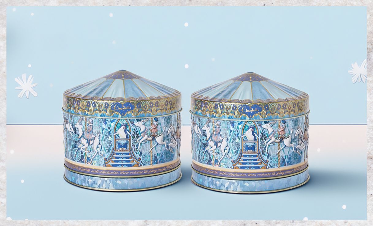 Churchill's set of two musical carousel shortbread tins